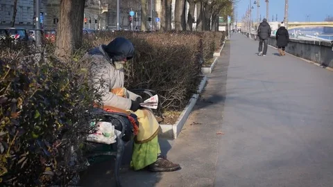 Homeless read the newspaper Stock Footage 70403445