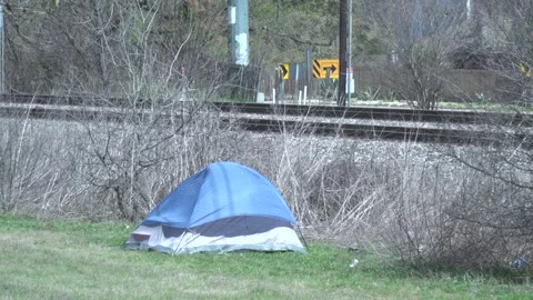 Homeless Tent by train tracks in Austin, Texas 3-16-2025 Stock Footage 304387944