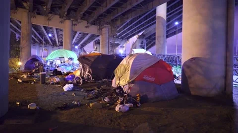 Homeless Tents Under A Bridge Stock Footage
