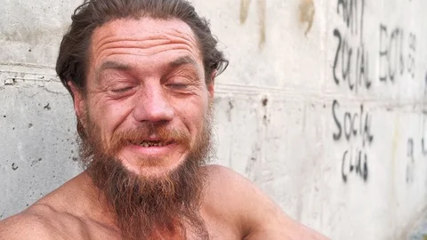 Homeless wanderer talks on the camera 스톡 동영상 120360970