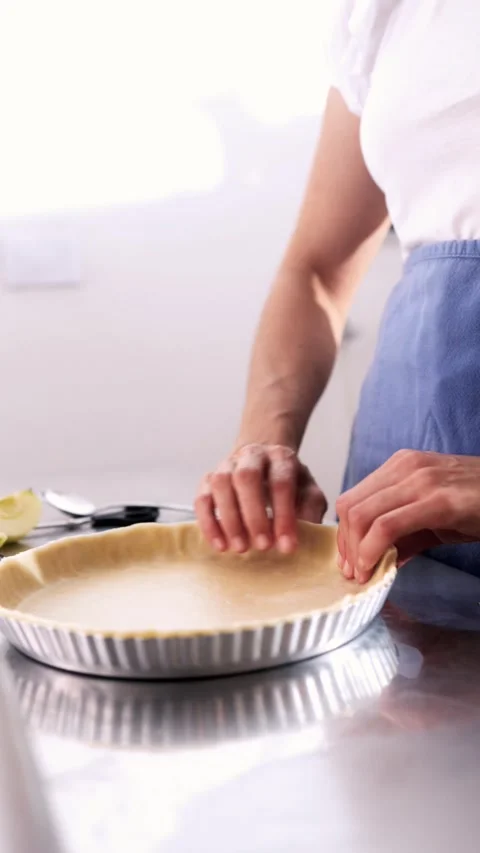 Homemade apple pie preparation in kitchen - Thanksgiving holiday baking - Stock Footage 329456482