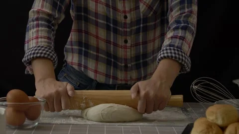 Homemade baker flour dusting on dough, handmade bread dough rolling and kneading Stock Footage 244986448