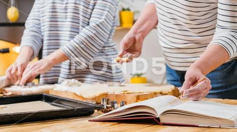 Homemade biscuits women recipe cookery book Stock Photos