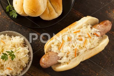 Homemade bratwurst with sauerkraut Stock Photos
