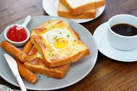 Homemade bread, bread, fried eggs and breakfast coffee Stock Photos