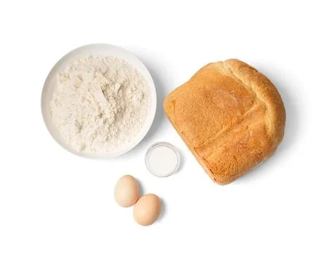 Homemade bread cooked in a bread machine and ingredients for baking on a wh.. Stock Photos