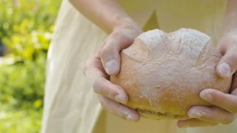 Homemade bread in female hands Stock Footage 137838535