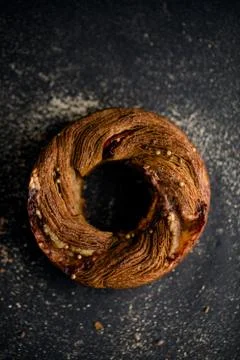 Homemade bread loaf on rustic dark background Stock Photos