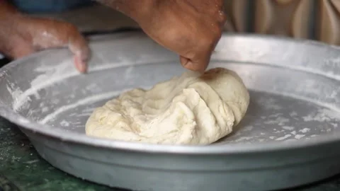 Homemade Bread Making with Female Hand Kneading Atta Flour Dough. Stock Footage 339870958