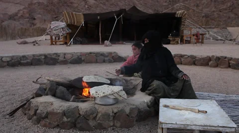 Homemade bread preparation in a Beduin Camp in Sinai, Egypt Stock Footage 39224981