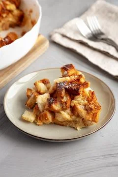 Homemade Bread Pudding on a Plate, side view. Stock Photos