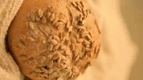 Homemade bread on a rustic background. Vertical video of fresh bread. Stock Footage 137358544