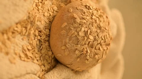 Homemade bread on a rustic background. Vertical video of fresh bread. Stock Footage 137358654