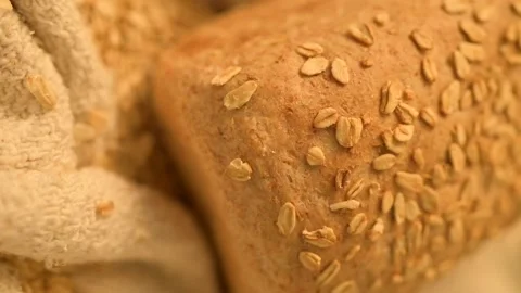 Homemade bread on a rustic background. Vertical video of fresh bread. Stock Footage 137359040