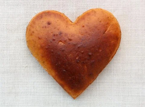 Homemade bread in the shape of heart Stock Photos