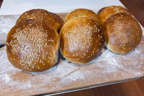 Homemade bread on table with light white flour. Stock Photos