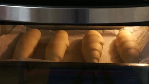 Homemade breadrolls baking in oven, sped-up Stock Footage 142510009