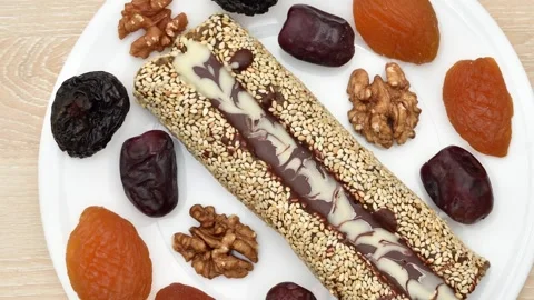 Homemade cake dessert and dried fruits on the white plate Stock Footage 269536853