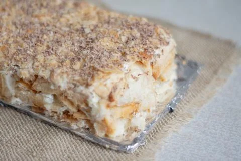 Homemade cake with grated chocolate, close-up. Stock Photos