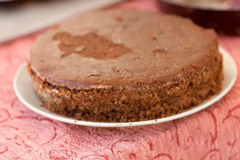 Homemade cake lacking in decorating. Stock Photos
