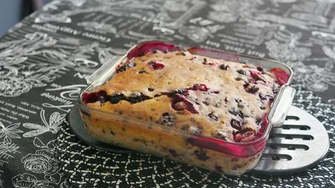 Homemade cherry pie baked in a rectangular glass baking dish with a golden crust Fotos Stock
