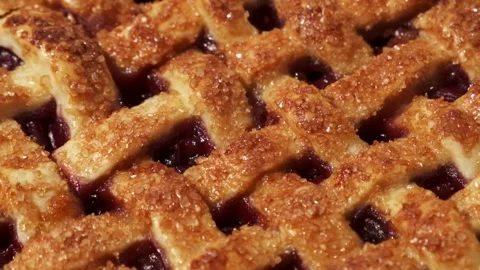 Homemade cherry pie with Flaky Crust as a textured background Stock Footage 258789428