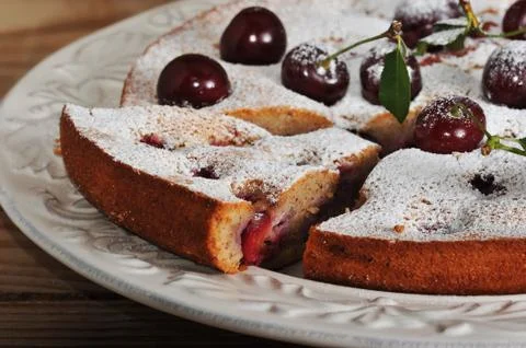 Homemade cherry pie on rustic background Stock Photos