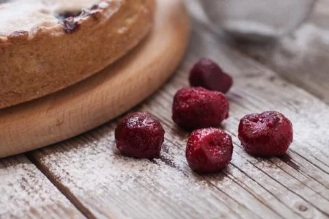 Homemade cherry pie on rustic background. Stock Photos