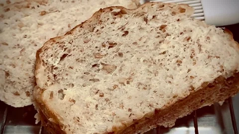 Homemade coarse whole wheat bread in tray,organic ingredients,show texture .. Stock Footage 340304665