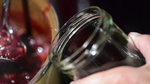Homemade Cooking cherry fruit jam. filling into glass jar. 스톡 동영상 132438780