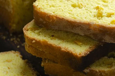 Homemade cornbread slices on kitchen table zoomed image Stock Photos