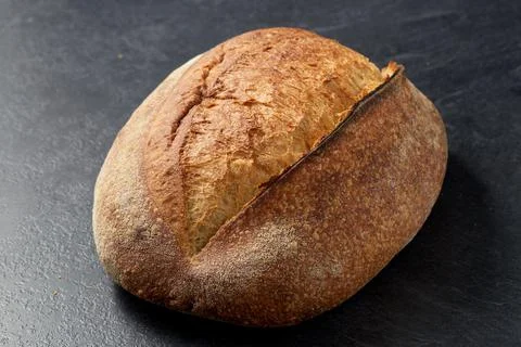 Homemade craft bread on table Stock Photos