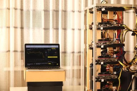 A homemade crypto mining rig, built from various computer components in a m.. Stock Photos