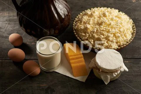 Homemade dairy and eggs on the table Stock Photos