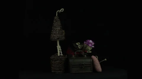 Homemade doll rotates on a black background loop Stock Footage 34963922