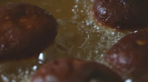 Homemade donuts frying Stock Footage 58651978