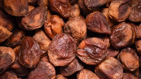 Homemade dried apricots on rotating background. Dried fruits background. Vegan Stock Footage 125367002
