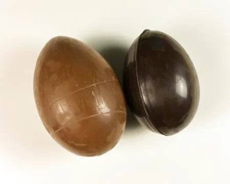 Homemade easter eggs on white background - top view Stock Photos