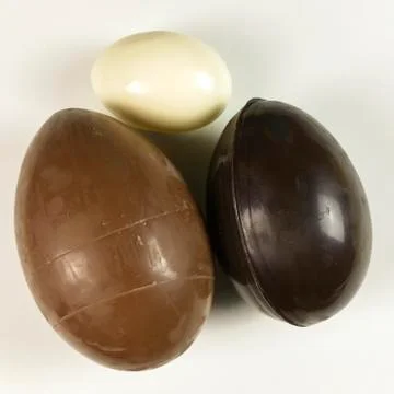 Homemade easter eggs on white background - top view Stock Photos
