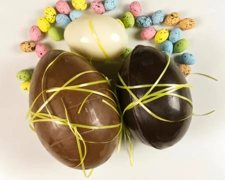 Homemade easter eggs on white background - top view Stock Photos