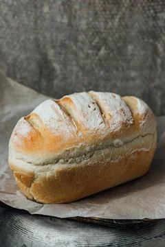Homemade, fresh bread cools down after baking. Selective focus. place for tex Stock Photos