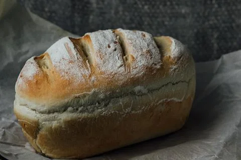 Homemade, fresh bread cools down after baking. Selective focus. place for tex Stock Photos
