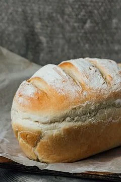Homemade, fresh bread cools down after baking. Selective focus. place for tex Stock Photos
