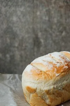 Homemade, fresh bread cools down after baking. Selective focus. place for tex Stock Photos