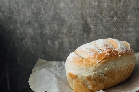 Homemade, fresh bread cools down after baking. Selective focus. place for tex Stock Photos