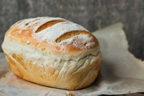 Homemade, fresh bread cools down after baking. Selective focus. place for tex Stock Photos