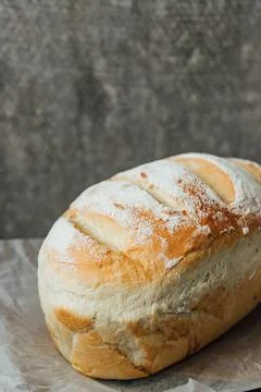 Homemade, fresh bread cools down after baking. Selective focus. place for tex Foto stock