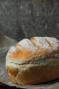 Homemade, fresh bread cools down after baking. Selective focus. place for tex Foto stock