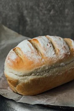 Homemade, fresh bread cools down after baking. Selective focus. place for tex Stock Photos