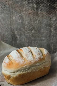 Homemade, fresh bread cools down after baking. Selective focus. place for tex Foto stock